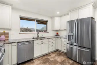 Not pictured is a walk-in pantry, located right behind this POV.