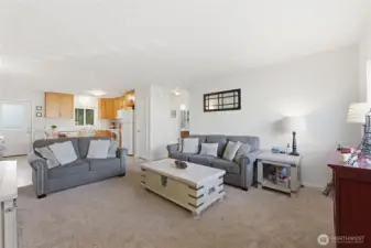 Open concept living, dining and kitchen.