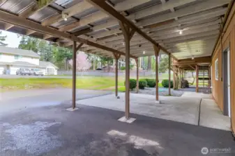 Covered parking for 3 cars... potentially 4 or recreational vehicle as one spot is extended longer.