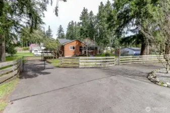 Gated entrance and beautiful paved driveway!