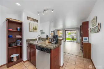 Extra shelving provides a practical storage solution for guest items, enhancing comfort and organization.