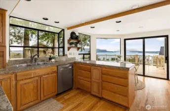 Kitchen with bay window overlooking backyard and views of the bay