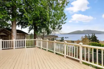 Large wood deck off kitchen