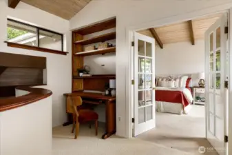 Upper level office nook off primary suite with French doors