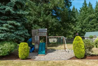 Landscaped play area on the property.