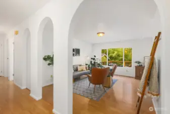 Charming arches separate the living area from the hall