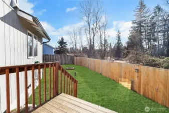 Back yard is adjacent to a greenbelt providing a beautiful natural view.