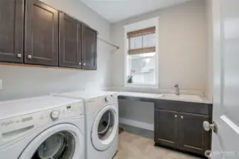 Laundry room with lots of cabinets!