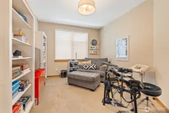 Main floor den or home office adds depth to this hard-working home.