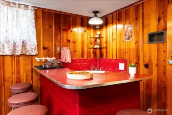 Functionality and personality, this original retro wet bar is a conversation piece and a complete showstopper