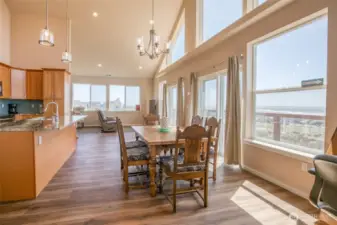 Moving out of the kitchen, you enter the living room, and around the corner is the primary suite.