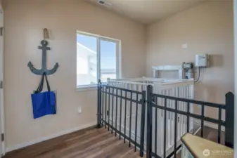 Rounding out the upstairs is the front entry, with the Legacy Lift that goes down to the garage.