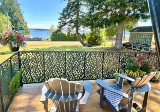 The deck is included in the sale. Have a seat and enjoy this beautiful setting.