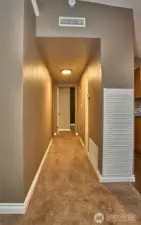 Hallway to bedrooms and custom full bath.