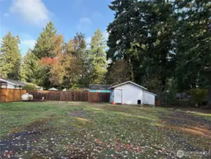 Backyard with storage shed.
