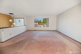 Large picture window and vaulted entry create lots of natural light.