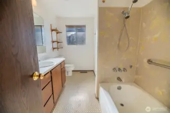 Full bathroom off the hallway. New plumbing!