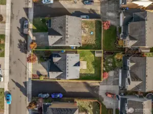 Home is nestled on a corner lot.