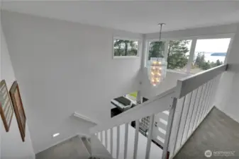 Upper landing is accented with a sneak peek View of Puget Sound