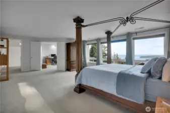 Primary EnSuite is grand in size and features a wall of windows to the amazing Sound Views + City of Seattle