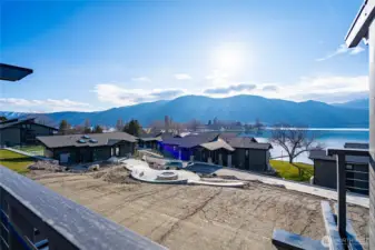 Yacinde G3 overlooks the new gas community firepit, with Lake Chelan views on the horizon.