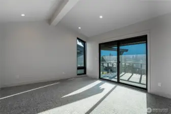 This light-filled second bedroom also features a glorious view of Lake Chelan with a private deck.