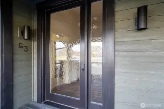 Frosted clearlight glass front door for privacy and light.