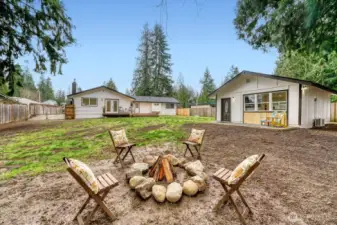 Enjoy outdoor space, firepit & room to garden & entertain. Fully fenced backyard. Updated 1630sqft, 4-bedroom, 1.75 bath with DADU 480sqft. Shed on right side of DADU. Not in picture. Double gate for RV/boat parking.