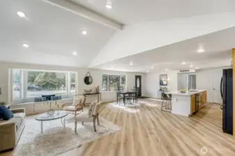 Sunlight fills every room with natural light. The inviting open floor plan creates an easy flow for everyday living & entertaining, while vaulted ceilings add a spacious, airy feel.