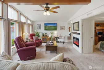 Enter to the vaulted ceilings and large view windows that create a bright & airy atmosphere that showcases all this home has to offer.