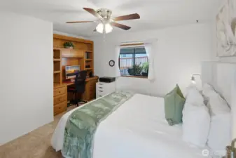 First guest bedroom with built-in desk and hutch