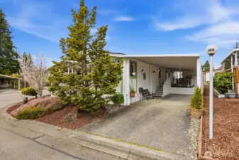 Spacious driveway and carport