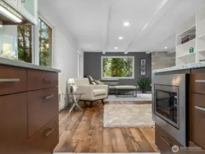 Open concept luxurious entertainment flows seamlessly from the gourmet kitchen to the heart of the home.