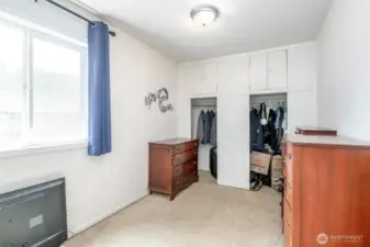 Bedroom on main floor. Look at those built ins!