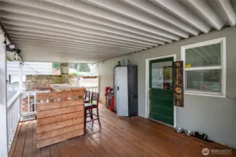 Covered porch off laundry room.