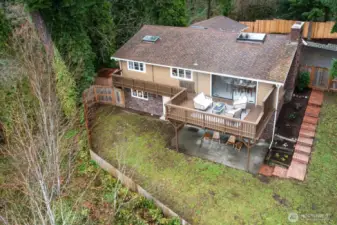 A feeing of privacy from this large, fenced yard, on a gentle slope with space to create an urban garden offering year-round outdoor enjoyment
