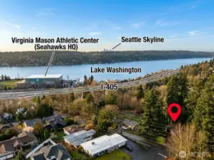 Open concept great room, dining, and kitchen with stunning lake view