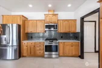 Stainless steel appliances including gas stove