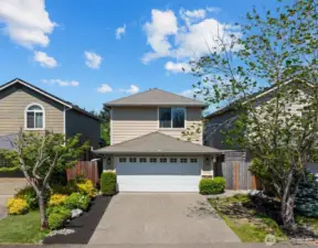 2-car garage with driveway parking