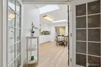 french doors to bright kitchen
