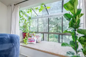 Get cozy in this window nook in the living room and take in the territorial views.