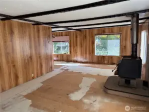 Living room w/ wood burning stove