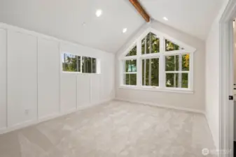 Custom millwork extends into the serene primary suite