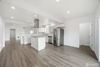 Natural lighting and open concept space makes this area feel extra large.