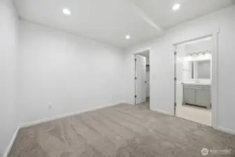 Primary Bed Looking into Bath and walk in closet