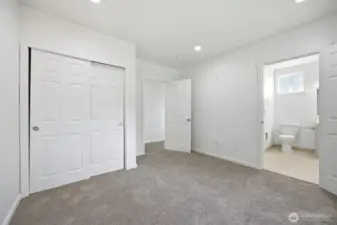 Guest bed looking into Second bath.