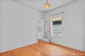 Back downstairs off the entry & dining room is the den