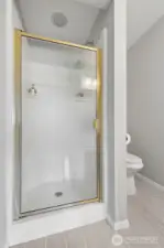 Shower in the lower level bathroom.