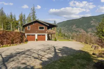 2 car attached garage, covered parking for at least four other vehicles in the pole barn, and uncovered parking is pretty much unlimited!