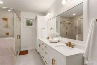 Beautiful updated primary bathroom with dual sink vanity.